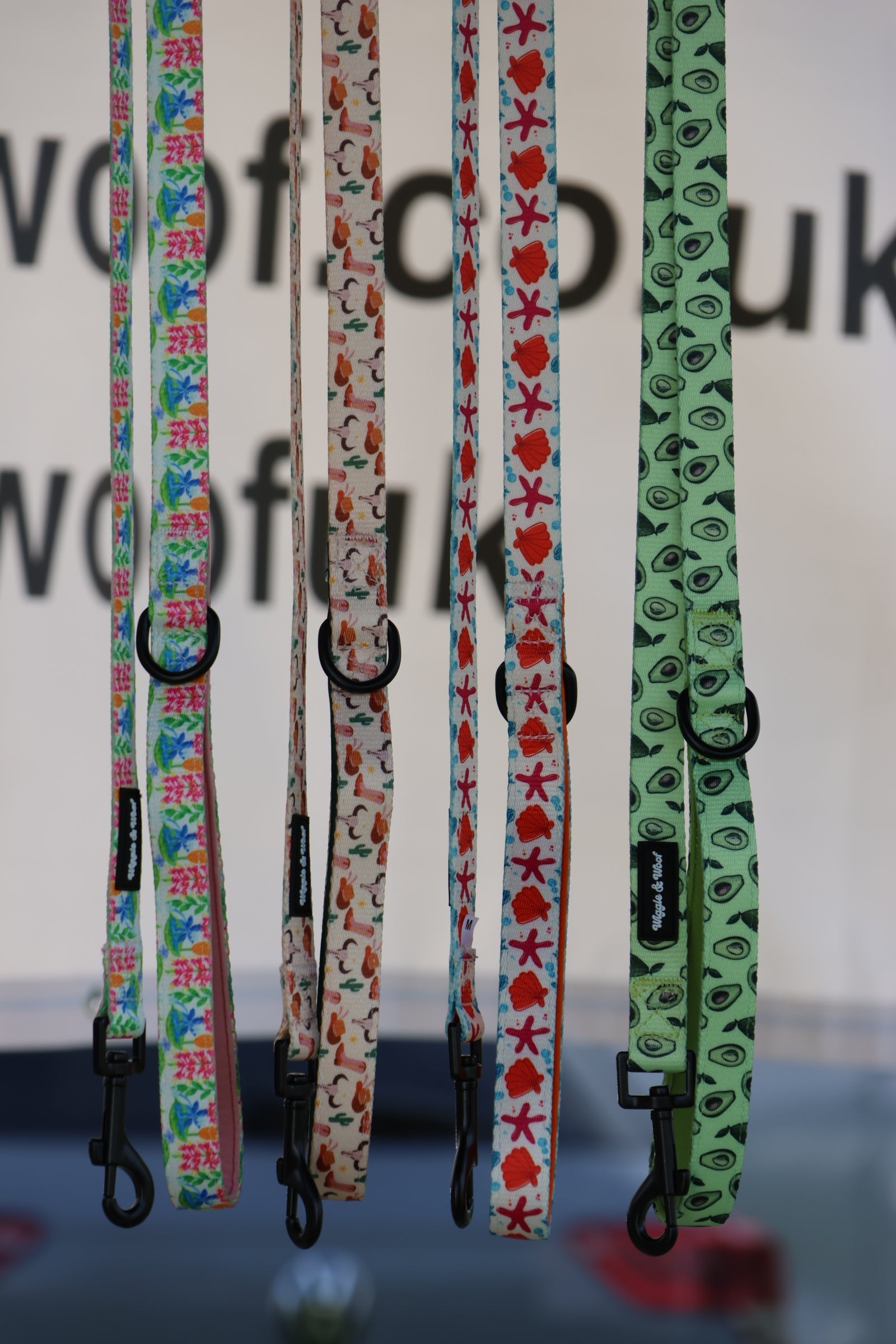Wiggle & Woof dog leads on display stand 